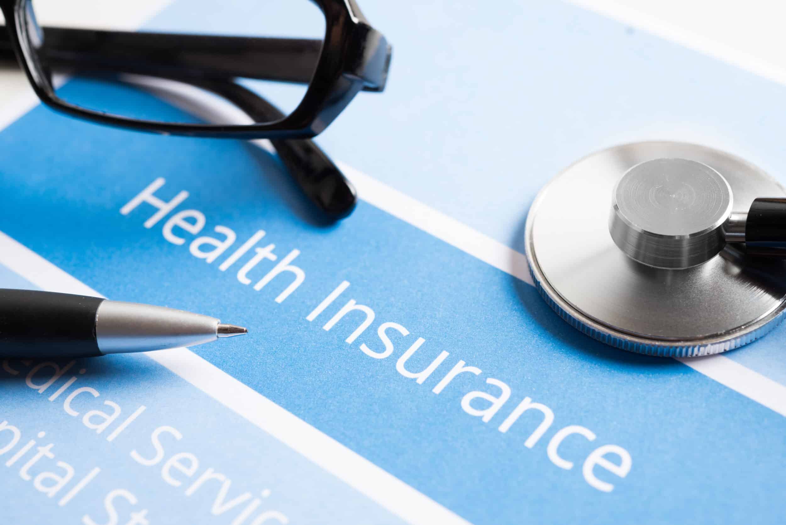 Health insurance card and paperwork