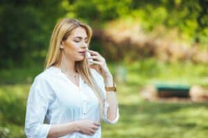 Woman with pollen allergy tries to improve her breathing. Woman with pollen allergy tries to improve her breathing.